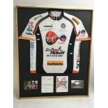 A framed cycling shirt signed by Freddie Flintoff