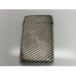 A cased Chester silver ribbed card case