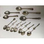 A collection of silver spoons including some Chine