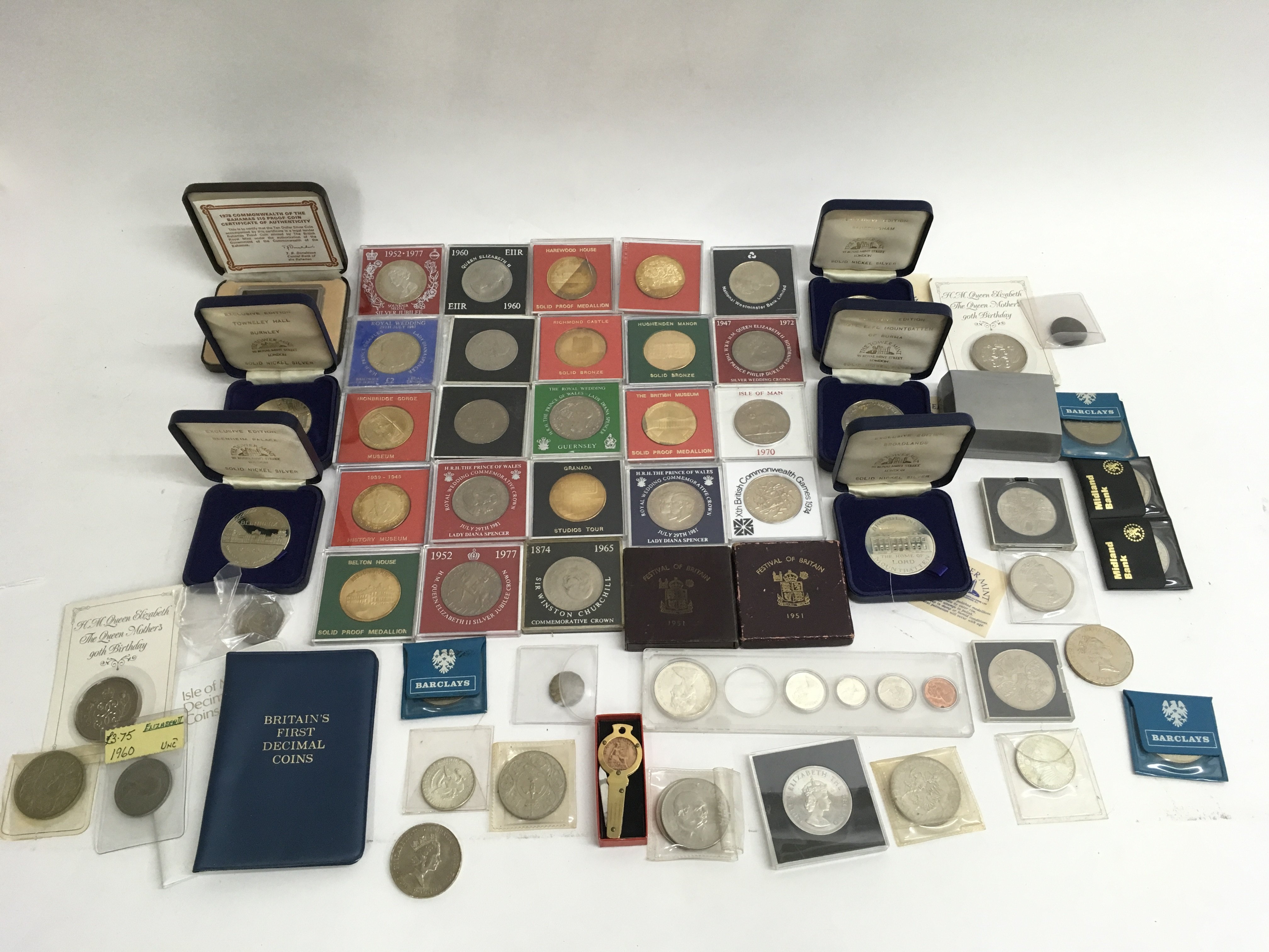 A collection of proof and royal commemorative coin