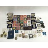 A collection of proof and royal commemorative coin