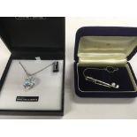 A boxed new Swarovski heart shaped necklace along