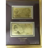 A framed pair of 99.9 pure gold notes ten shilling