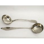 A continental white metal ladle and a silver plate