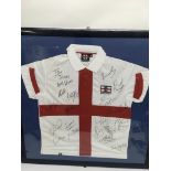 A framed and glazed signed England football shirt