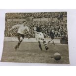 A black and white football photo showing the 1939