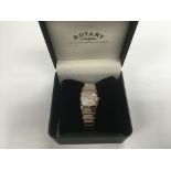 A boxed Rotary rocks diamond set watch.