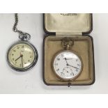 A gold plated button wind pocket watch with Arabic