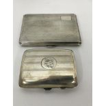 Two silver cigarette cases