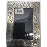 A Morden silver photo frame having arts and crafts