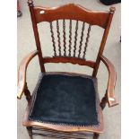 An American chair with barley twist legs, and an E