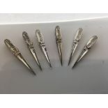 A set of 6 silver Olive sticks 5.5cm