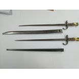 Two M1874 French bayonets with combined brass and