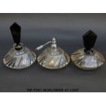 An Art Deco style glass dressing table set comprising scent bottle,