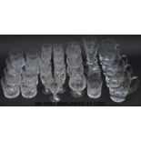 A collection of Royal Doulton and other cut glasses including wine glasses,