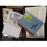 A quantity of empty stamp albums together with PHQ cards and various albums of foreign stamps