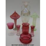 Eight pieces of clear and coloured glassware to include a vaseline posy vase,