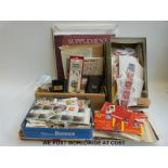 A large quantity of loose stamps together with album supplement sheets, a GB Concise catalogue,