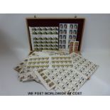 A quantity of mint GB stamps in a cigar box,