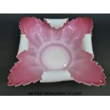 Stourbridge cased glass bowl with white casing over pink interior,