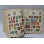 A Strand stamp album and contents