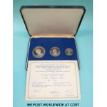 A cased set of three silver medal coins commemorating The Investiture of HRH Prince Charles as