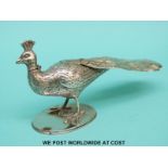 A Victorian hallmarked silver novelty scent bottle formed as a peacock with hinged head,