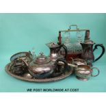 Two bottle tantalus and a collection of plated ware including tray, teaware etc.