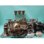 A quantity of plated ware including tea set, trays, goblets, candlesticks, bottle tickets etc.