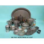 A collection of craftsman and other hammered Arts & Crafts/Art Deco pewter including tea set on