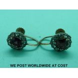 A pair of Victorian earrings set with paste stones