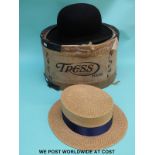 A vintage bowler hat and staw boater in Tress London hat box