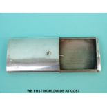 A George V hallmarked silver vesta or cigarette case of unusual slide out design,
