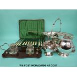 A quantity of silver plated ware including swing handled basket, cased cutlery, ladles etc.