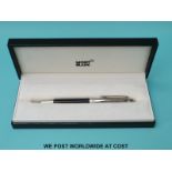 Montblanc Meisterstuck ballpoint pen with chrome cap and clip and engraved black resin barrel,