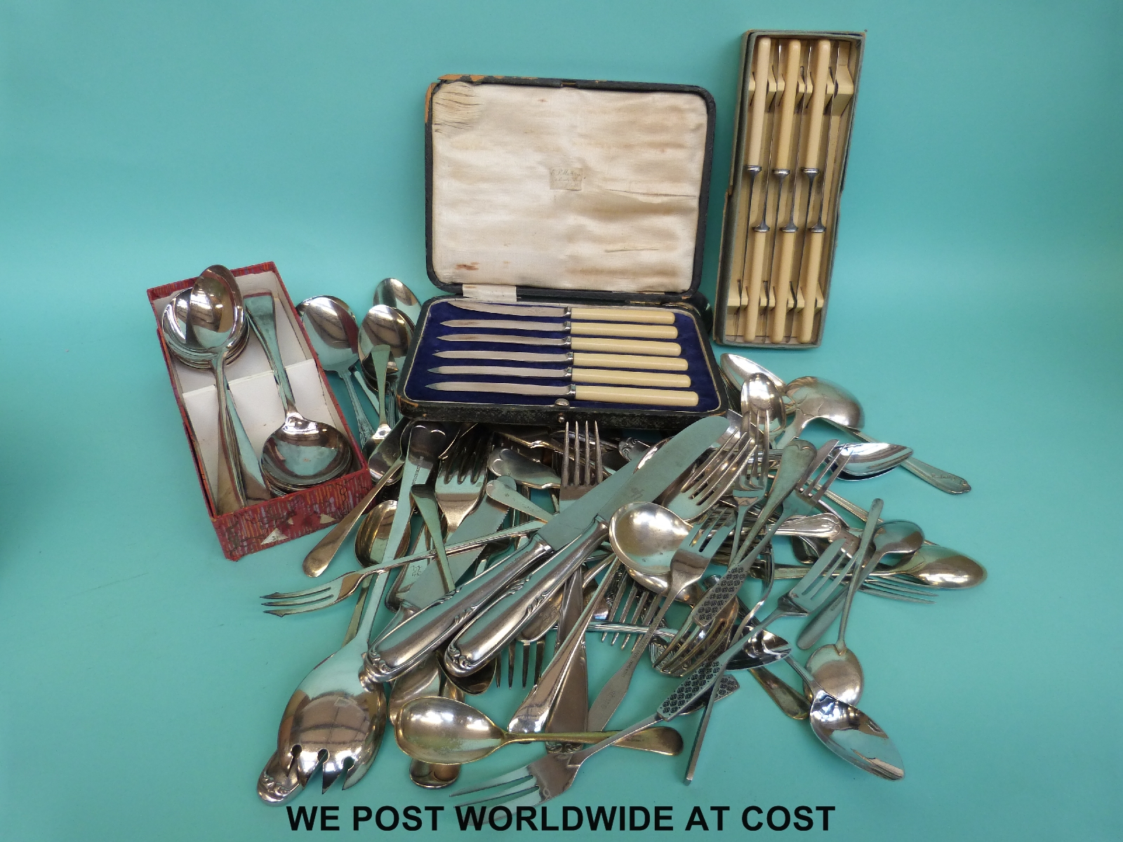 A collection of silver plated cutlery including some cased sets.