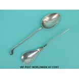 A hallmarked silver golfing spoon, Chester possibly 1924 and a mote spoon,