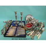 A quantity of silver plate to include candlesticks, Guernsey cream jug,