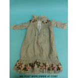 A child's Victorian dress (2-3 years old) with finely embroidered flowers to the collar and shirt