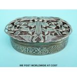 An Edward VII Art Nouveau hallmarked silver trinket box with pierced lid decorated with birds and