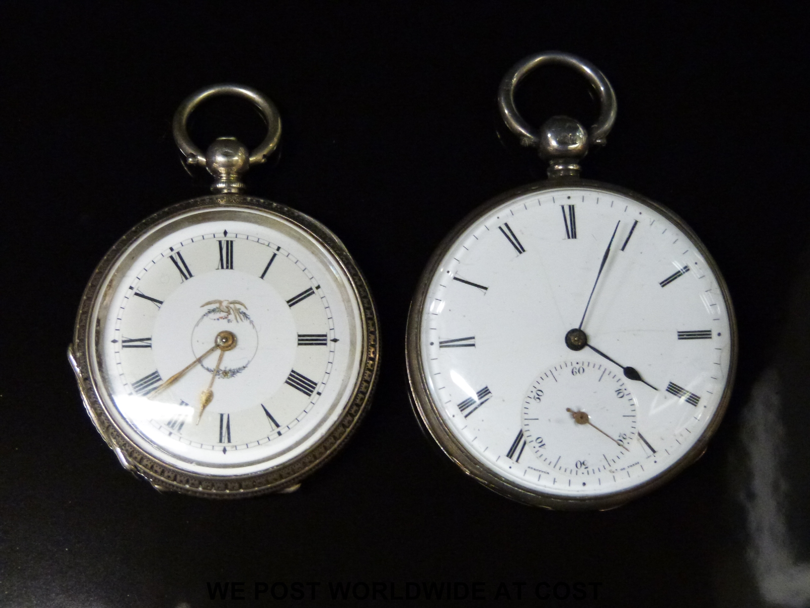 Two continental white metal pocket watches, one with inset subsidiary seconds dial,