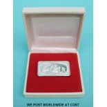 A boxed Franklin Mint Christmas 1974 ingot marked solid sterling silver (66g)