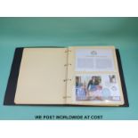 A coin / stamp cover album to celebrate the Queen's 80th birthday