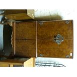 An Art Deco style walnut drinks cabinet raised on cabriole legs (W68 x D45 x H145cm)