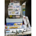 Twelve Airfix, Tamiya, Revell and other model kits including aircraft, military vehicles etc,