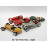 Five Burago 1:18 scale diecast model cars