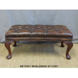 A leather Chesterfield footstool