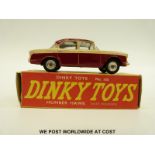 Dinky Toys diecast model Humber Hawk with windows and two-tone maroon and cream body, 165,