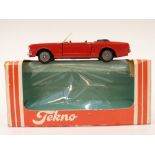 Tekno diecast model Ford Mustang with red body and black interior, 834, in original box.