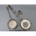 Schatz Elexacta swinging clock with bracket plus another similar example